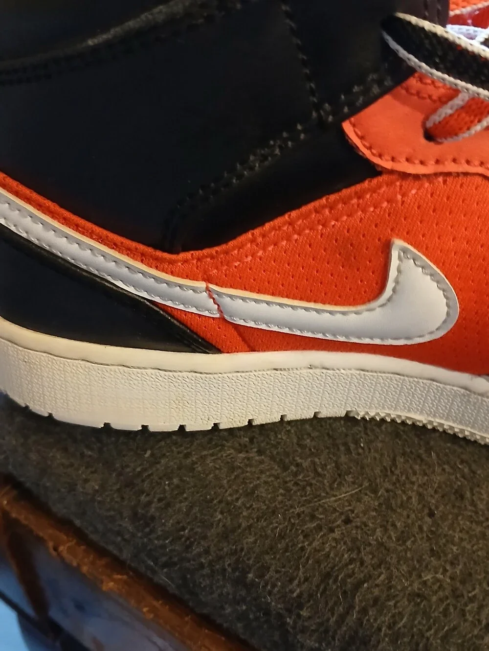 Nike Kids White and Orange High-Top Sneakers with Black Accents